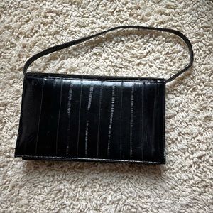 Eel skin and suede black purse